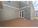 Large deck with gray siding and brown composite decking at 4002 Moody Ln, Woodstock, GA 30188