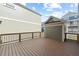 Spacious deck with gray siding and brown composite decking at 4002 Moody Ln, Woodstock, GA 30188