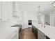 Eat-in kitchen with stainless steel appliances and custom cabinetry at 4002 Moody Ln, Woodstock, GA 30188