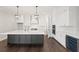 Modern kitchen featuring a large island and stainless steel appliances at 4002 Moody Ln, Woodstock, GA 30188