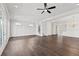 Spacious living area with hardwood floors, high ceilings and a view to the kitchen at 4002 Moody Ln, Woodstock, GA 30188