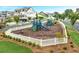 Community playground with shade sails and play equipment at 4002 Moody Ln, Woodstock, GA 30188