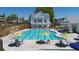Resort-style pool with lounge chairs and umbrellas at 4002 Moody Ln, Woodstock, GA 30188