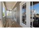 Charming front porch with gray siding and white columns at 4002 Moody Ln, Woodstock, GA 30188