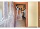 View of a home's entryway, showcasing a wooden staircase and front door at 1225 Clifton Rd, Atlanta, GA 30307
