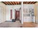 Kitchen area with white cabinets, marble countertops, and tiled floor at 1225 Clifton Rd, Atlanta, GA 30307