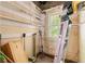 Small pantry with shelves, window and tools; requires renovation at 1225 Clifton Rd, Atlanta, GA 30307