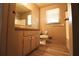 Bathroom with a toilet, vanity, and shower/tub combo at 2400 Reynolds Rd, Atlanta, GA 30331