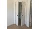Bedroom closet with wire shelving for hanging clothes and storage at 5671 Radford Loop, Fairburn, GA 30213