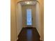 Bright entryway with hardwood floors and door to outside at 5671 Radford Loop, Fairburn, GA 30213