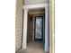 Front entry with columns and brick detail at 5671 Radford Loop, Fairburn, GA 30213