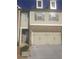 Two story townhome with double garage and neutral colors at 5671 Radford Loop, Fairburn, GA 30213