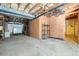 Unfinished basement area with various storage options at 3310 Bryan Sw Way, Marietta, GA 30008