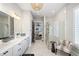 Spa-like bathroom with walk-in shower and marble floors at 152 Grand Cres, Alpharetta, GA 30009