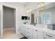 Elegant bathroom with double vanity and large mirror at 152 Grand Cres, Alpharetta, GA 30009