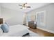 Spacious bedroom with wood floors and plantation shutters at 152 Grand Cres, Alpharetta, GA 30009