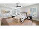 Spacious bedroom with hardwood floors and ceiling fan at 152 Grand Cres, Alpharetta, GA 30009