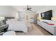 Main bedroom with large TV and walk-in closet at 152 Grand Cres, Alpharetta, GA 30009