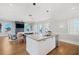 Open concept kitchen with island and hardwood floors at 152 Grand Cres, Alpharetta, GA 30009