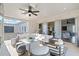 Spacious outdoor patio with comfortable seating, access to the interior, and views of the neighborhood at 152 Grand Cres, Alpharetta, GA 30009