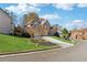 Brick two-story house on a tree lined street at 1415 Chadwick Ridge Ct, Lawrenceville, GA 30043