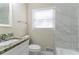 Updated bathroom with granite countertop and a bathtub at 1777 W Austin Rd, Decatur, GA 30032