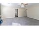 Spacious living area with gray carpeting and neutral walls at 1777 W Austin Rd, Decatur, GA 30032