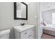 Simple bathroom with vanity, toilet and mirror at 20 Pine Canyon Sw Dr # 26, Atlanta, GA 30331