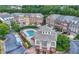 Aerial view of community pool and townhouses at 2252 Edgartown Se Ln # 2, Smyrna, GA 30080
