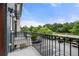 Outdoor balcony overlooking parking lot and wooded area at 2252 Edgartown Se Ln # 2, Smyrna, GA 30080