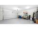 Attached garage with epoxy flooring and storage shelving at 2252 Edgartown Se Ln # 2, Smyrna, GA 30080
