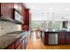 Spacious kitchen featuring granite countertops, stainless steel appliances, and ample cabinetry at 2252 Edgartown Se Ln # 2, Smyrna, GA 30080