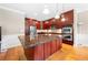 Modern kitchen with large island, granite countertops, and stainless steel appliances at 2252 Edgartown Se Ln # 2, Smyrna, GA 30080