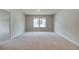 Spacious bedroom with carpet and neutral walls at 250 Arnewood Cir, Mcdonough, GA 30253