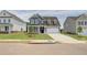 Two-story house with gray siding, white trim, and a two-car garage at 250 Arnewood Cir, Mcdonough, GA 30253