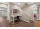 Basement hallway with craft area and hardwood floors at 3015 Oaktree Ne Ct, Marietta, GA 30066