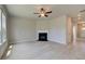 Living Room with corner fireplace and hardwood floors at 565 Teversham Dr, Mcdonough, GA 30253