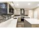 Modern kitchen with stainless steel appliances and quartz countertops at 4055 Butternut, Atlanta, GA 30349