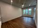 Bright and spacious living room with hardwood floors and access to rear deck at 1314 Breezy Street # 229, Atlanta, GA 30315