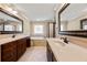 Main bathroom with double vanity, soaking tub, and shower at 2214 Whispering Cv, Decatur, GA 30033