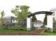 Wills Overlook entrance with brick pillars, signage, and a paved driveway at 531 S Main St # 410, Alpharetta, GA 30009