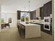Modern kitchen with dark cabinets, large island, and stainless steel appliances at 531 S Main St # 410, Alpharetta, GA 30009