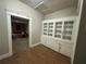 Built-in hutch and hardwood floors in dining area at 603 Willard Sw Ave, Atlanta, GA 30310