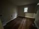 Simple laundry room with hardwood floors at 603 Willard Sw Ave, Atlanta, GA 30310