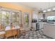 Cozy kitchen with white cabinets, breakfast nook, and stainless steel appliances at 260 Manning Sw Rd # 125, Marietta, GA 30064