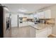 Spacious kitchen with granite countertops and white cabinets at 7463 Lerose Dr, Jonesboro, GA 30236