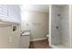 Updated bathroom with granite countertop vanity and a walk-in shower at 2363 Dabney Ter, Atlanta, GA 30344