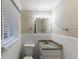 Clean bathroom, granite countertop, white tile, and new fixtures at 2363 Dabney Ter, Atlanta, GA 30344