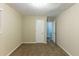 Bright bedroom with neutral walls, carpeting, and an additional door at 2363 Dabney Ter, Atlanta, GA 30344