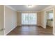 Dining area with hardwood-look floors and neutral color palette at 2363 Dabney Ter, Atlanta, GA 30344